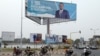  FILE - A billboard of Faure Gnassingbe is pictured on a street in Lome, Togo, Feb. 19, 2020.