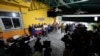 Venezuelan community leaders speak during a press conference to denounce changes to the protections that shielded hundreds of thousands of Venezuelans from deportation, Feb. 3, 2025, in Doral, Florida.