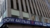 A Fox News ticker tape on the side of the News Corp. Building displays statistics about the stock market, in New York City, March 12, 2025.