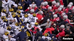 Michigan Wolverines and Ohio State Buckeyes fight following the NCAA football game at Ohio Stadium in Columbus, Nov. 30, 2024. Michigan won 13-10. (Barbara J. Perenic/USA TODAY Network via Imagn Images)