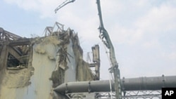 A machine collects radioactive material in the air for sampling at the Unit 3 reactor of Fukushima Daiichi Nuclear Power Station in Fukushima prefecture in this handout picture taken on June 13 and released on June 14, 2011