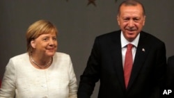 Chansela wa Ujerumani Angela Merkel na Rais wa Uturuki Recep Tayyip Erdogan