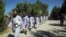 FILE - Prisoners are released from Bagram Prison in Parwan province, Afghanistan, May 26, 2020.