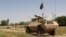 FILE - A military vehicle patrols in the Babaji area of Lashkar Gah Helmand province, Afghanistan, May 8, 2016. Afghan National Security and Defense Forces (ANDSF) entered Nawa district in southern Helmand province early Monday.