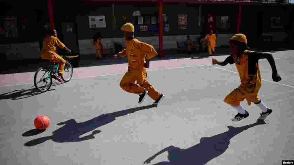 Children from the the African Hebrew Israelite community, popularly known as "the Black Hebrews", play soccer during celebrations for New World Passover, marking their exodus from the United States, in the southern city of Dimona May 18, 2016.&nbsp;