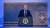 US President Donald Trump is seen on a large screen during his address by video conference at the World Economic Forum (WEF) annual meeting in Davos on January 23, 2025.