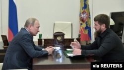 Президент
РФ Владимир
Путин и Рамзан Кадыров 