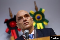 Brazil's Supreme Court Judge Alexandre de Moraes attends an event where he received a tribute by the Public Ministry of Sao Paulo, after the court ordered an immediate suspension of social media platform X in the country, in Sao Paulo, Aug. 30, 2024.