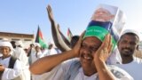 FILE: Supporters of Sudanese political and religious leader al-Sayid Mohamed Othman al-Mirghani gather at the airport to welcome him as he arrives in Khartoum, Sudan November 21, 2022.