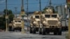 Kenyan police forces patrol a neighborhood in Port-au-Prince, Haiti, Sept. 4, 2024. 