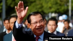 FILE - President of the ruling Cambodian People's Party and Prime Minister Hun Sen attends a ceremony to mark the 68th anniversary of the establishment of the party in Phnom Penh, Cambodia, June 28, 2019. 