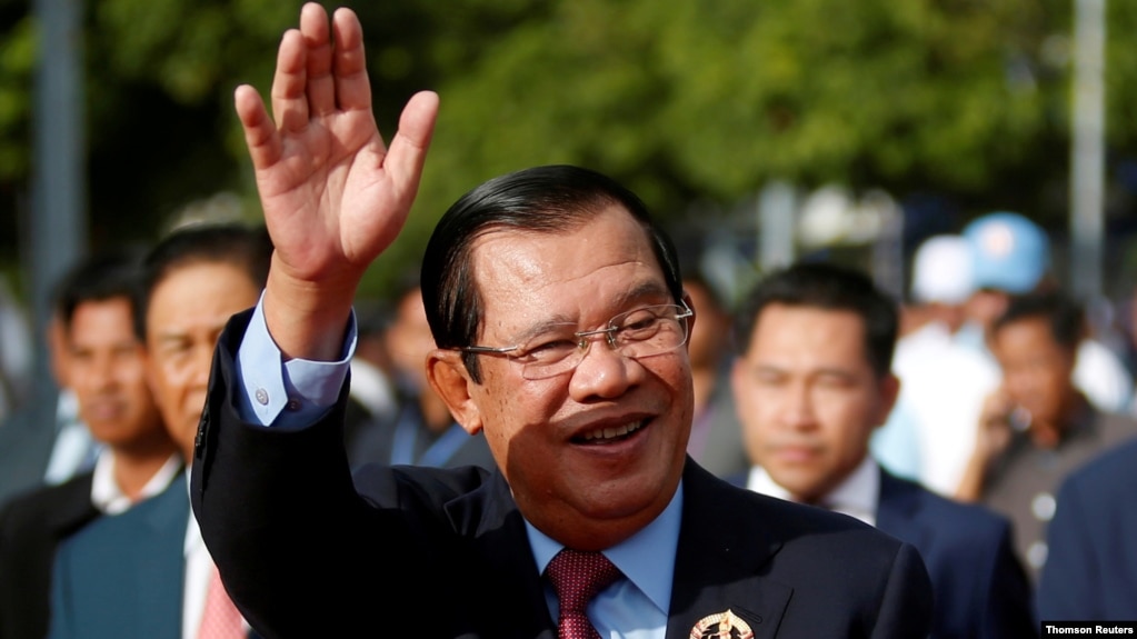 FILE - President of the ruling Cambodian People's Party and Prime Minister Hun Sen attends a ceremony to mark the 68th anniversary of the establishment of the party in Phnom Penh, Cambodia, June 28, 2019.