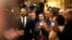 Journalists and supporters of Lebanese Prime Minister-designate Saad Hariri, left, clap as he arrives for a press conference, in Beirut, Lebanon, Nov. 13, 2018.