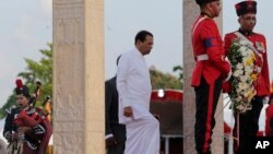Sri Lankan president Maithripala Sirisena arrives to place a wreath at the fallen heroes memorial during the tenth anniversary of Sri Lanka's civil war victory in Colombo, Sri Lanka, May 19, 2019.