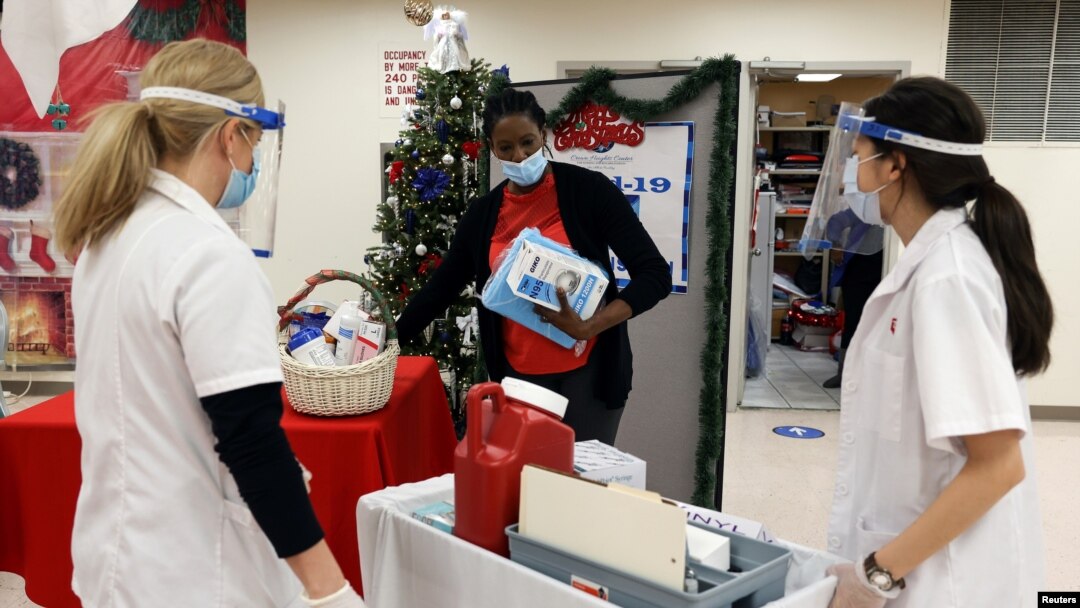 Walgreens Pharmacists prepare Pfizer-BioNTech coronavirus vaccines at Crown Heights Center for Nursing and Rehabilitation, a nursing home facility in Brooklyn, New York, Dec. 22, 2020.