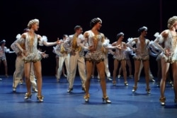 FILE - Dancers perform during the curtain call on the opening night of the musical "42nd Street," at the Theatre Royal, Drury Lane, London, April 4, 2017.