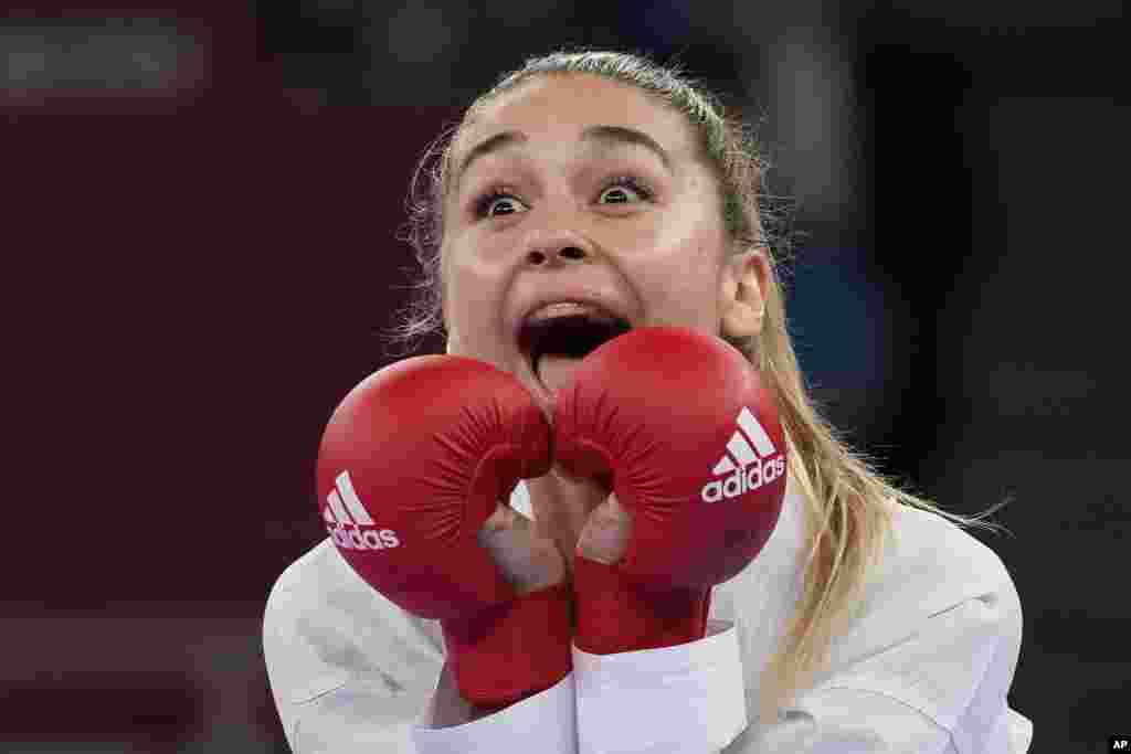 Anzhelika Terliuga of Ukraine reacts after winning against Wen Tzu-yun of Taiwan in the women&#39;s kumite -55kg semifinal bout for Karate at the 2020 Summer Olympics in Tokyo, Japan.