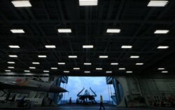 Fighter jets are seen on China's aircraft carrier Liaoning during a military drill of the Chinese People's Liberation Army (PLA) Navy in the East China Sea, April 20, 2018.