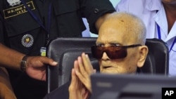 FILE - Nuon Chea, who was the Khmer Rouge's chief ideologist and No. 2 leader, sits in a court room before a hearing at the U.N.-backed war crimes tribunal in Phnom Penh, Cambodia, Nov. 16, 2018.