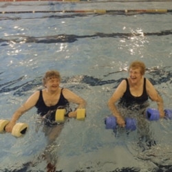 Swimmers in a water aerobics class in Sioux Falls, South Dakota. Experts say aerobic exercise can help people with headaches.