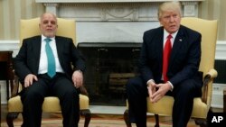 President Donald Trump meets with Iraqi Prime Minister Haider al-Abadi in the Oval Office of the White House in Washington, March 20, 2017.