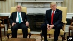 President Donald Trump meets with Iraqi Prime Minister Haider al-Abadi in the Oval Office of the White House in Washington, March 20, 2017. 