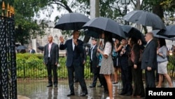 Presiden AS Barack Obama bersama istri dan kedua putrinya mengunjungi kota tua Havana, Kuba (20/3).