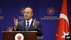 Turkey's Foreign Minister Mevlut Cavusoglu speaks during a joint press conference with Italy's Foreign Minister Luigi Di Maio, in Ankara, Turkey, June 19, 2020. Turkey and Italy continue to work for a lasting peace and political solution in Libya.