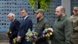 Ukraine's Defence Minister Rustem Umerov, Minister of Internal Affairs Ihor Klymenko, Foreign Minister Dmytro Kuleba and European Union Foreign Policy Chief Josep Borrell visit the Memory Wall of Fallen Defenders of Ukraine in Kyiv, Oct. 1, 2023. 