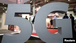 FILE - A logo of the upcoming mobile standard 5G is pictured in Hanover, Germany March 31, 2019.