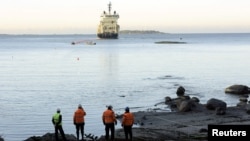 FILE - The C-Lion1 submarine telecommunications cable is being laid to the bottom of the Baltic Sea by cable ship Ile de Brehat on the shore of Helsinki, Finland on October 12, 2015. 