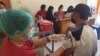 Syarat Nomor Induk Kependudukan Hambat Vaksinasi Kelompok Masyarakat Adat COVID-19