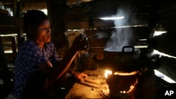 (File Photo) A villager cooks dinner on a cook stove in Koh Kong province, west of Phnom Penh, Cambodia.