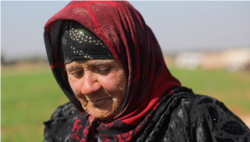 Fatoum Alshamali is a displaced mother of four, who says if the Syrian government attempts to take over the last opposition stronghold, she will fight because she has nowhere to go. Photo taken Feb 28, 2021 in Idlib, Syria. (Mohammad Daboul/VOA)