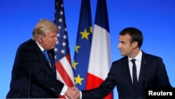 Le président américain Donald Trump et son homologue français, Emmanuel Macron, lors d’une conférence de presse à Paris, France, 13 juillet 2017.