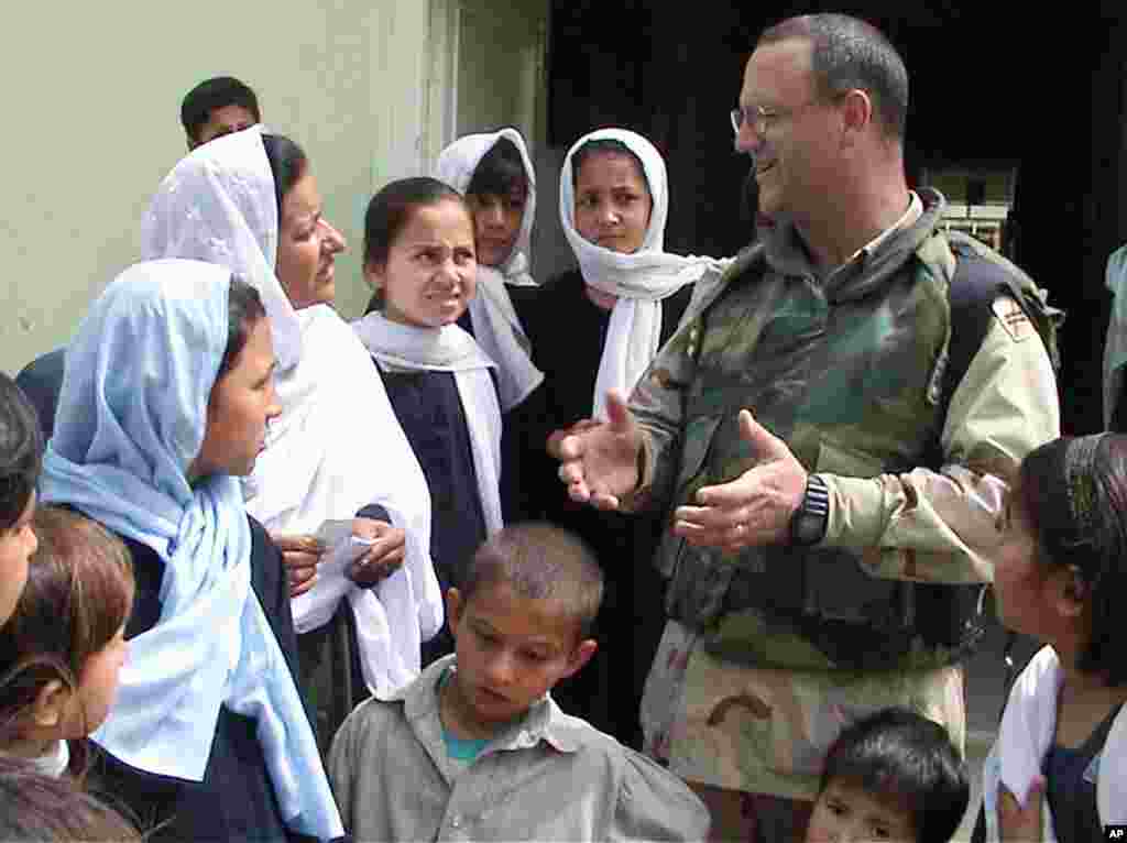 November, 2002 – The U.S. army creates military-civilian units, called provincial reconstruction teams, or PRTs as part of stabilization efforts.  PRTs were designed to help deliver basic services including security, health care and education. 