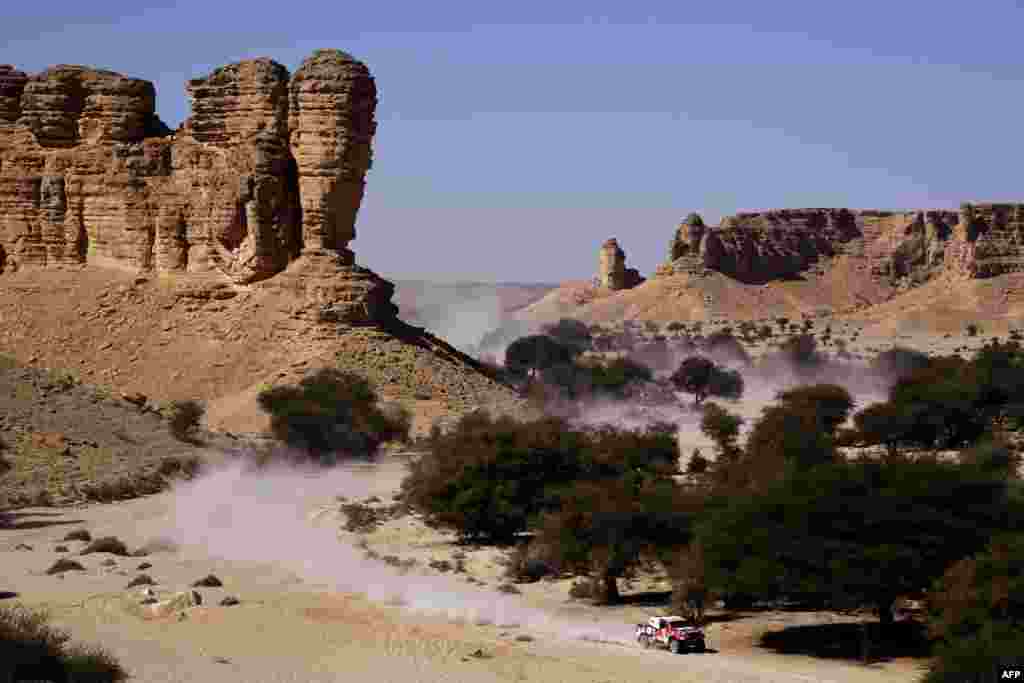 Toyota&#39;s driver Giniel De Villiers of South Africa and his co-driver Alex Bravo Haro of Spain compete during the Stage 9 of the Dakar 2020 between Wadi Al Dawasir and Haradh, Saudi Arabia.