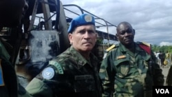 FILE - MONUSCO Force Commander General Carlos Alberto dos Santos Cruz, foreground, says there needs to be an evolution in the way MONUSCO works with the Congolese army. (Nick Long/VOA)