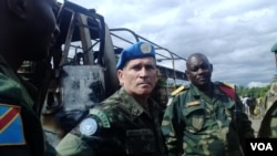 FILE - MONUSCO Force Commander General Carlos Alberto Dos Santos Cruz at the ambush site, Beni territory, eastern Congo, May, 2015. (Nicholas Long/VOA)