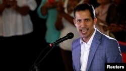 Venezuelan opposition leader Juan Guaido, who many nations have recognized as the country's rightful interim ruler, attends a rally against Venezuelan President Nicolas Maduro's government in Caracas, Venezuela, March 14, 2019.