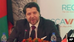 FILE - Deputy Foreign Minister Hekmat Khalil Karzai talks during the opening ceremony of the 6th Regional Economic Cooperation Conference of Afghanistan at the Foreign Affairs Ministry in Kabul, Sept. 3, 2015. Karzai revealed more than 1,300 foreign fighters had participated in the recent battle for control of northern city of Kunduz.