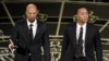 Common, left, and John Legend perform at the 87th Annual Academy Awards, Los Angeles, Feb. 22, 2015.