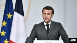 FILE - Rais wa Ufaransa Emmanuel Macron, Paris, Julai 9, 2021.(Photo by STEPHANE DE SAKUTIN / POOL / AFP)