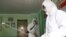 Offices at the Phyongchon District People's Hospital are disinfected to help curb the spread of the coronavirus on Wednesday, April 1, 2020, in Pyongyang, North Korea.