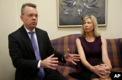 Pastor Andrew Brunson, left, gestures as his wife, Norine, listens during an interview at the headquarters of Christian Broadcasting Network in Virginia Beach, Va., Oct. 19, 2018. Brunson was recently released from prison in Turkey.