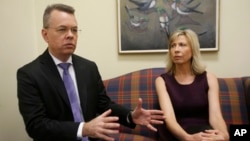 Pastor Andrew Brunson, left, gestures as his wife, Norine, listens during an interview at the headquarters of Christian Broadcasting Network in Virginia Beach, Va., Oct. 19, 2018. Brunson was recently released from prison in Turkey. 