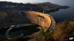 This photo shows the dam wall at Lake Kariba in Siavonga, Zambia, Thursday, Sept. 19, 2024. (AP Photo/Themba Hadebe)