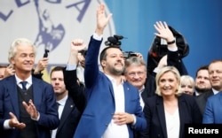 Geert Wilders, leader of Dutch party PVV (Party for Freedom), Italy's Deputy Prime Minister Matteo Salvini, Marine Le Pen, leader of French National Rally party attend a major rally of European nationalist and far-right parties in Milan, May 18, 2019.