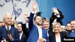 Geert Wilders, leader of Dutch party PVV (Party for Freedom), Italy's Deputy Prime Minister Matteo Salvini, Marine Le Pen, leader of French National Rally party attend a major rally of European nationalist and far-right parties in Milan, May 18, 2019.