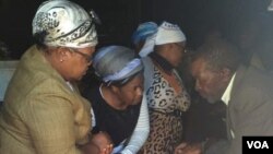 Mrs. Joice Mujuru attending a funeral ceremony in Zvimba communal lands.